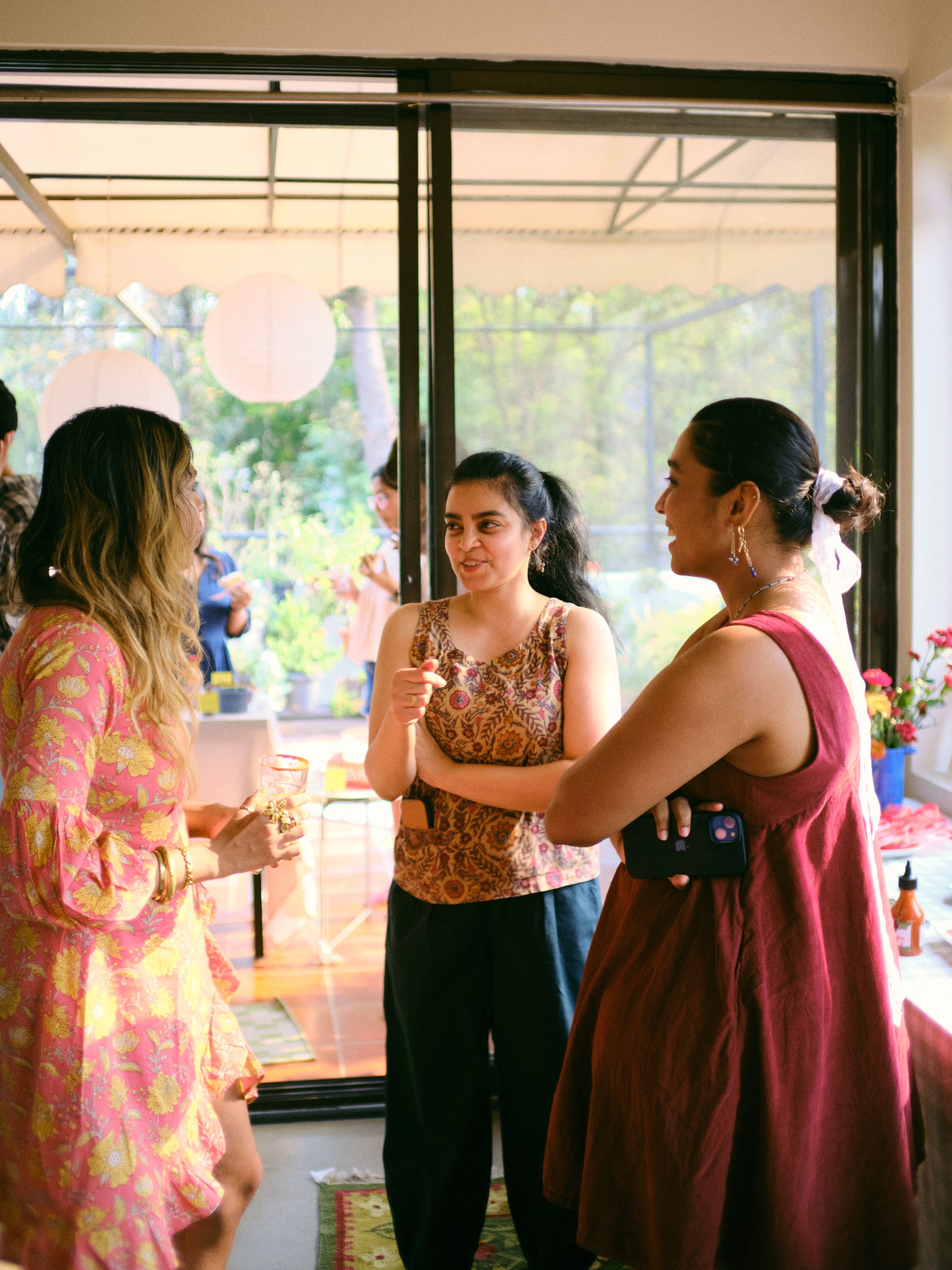Guests at a Rooted Objects open house